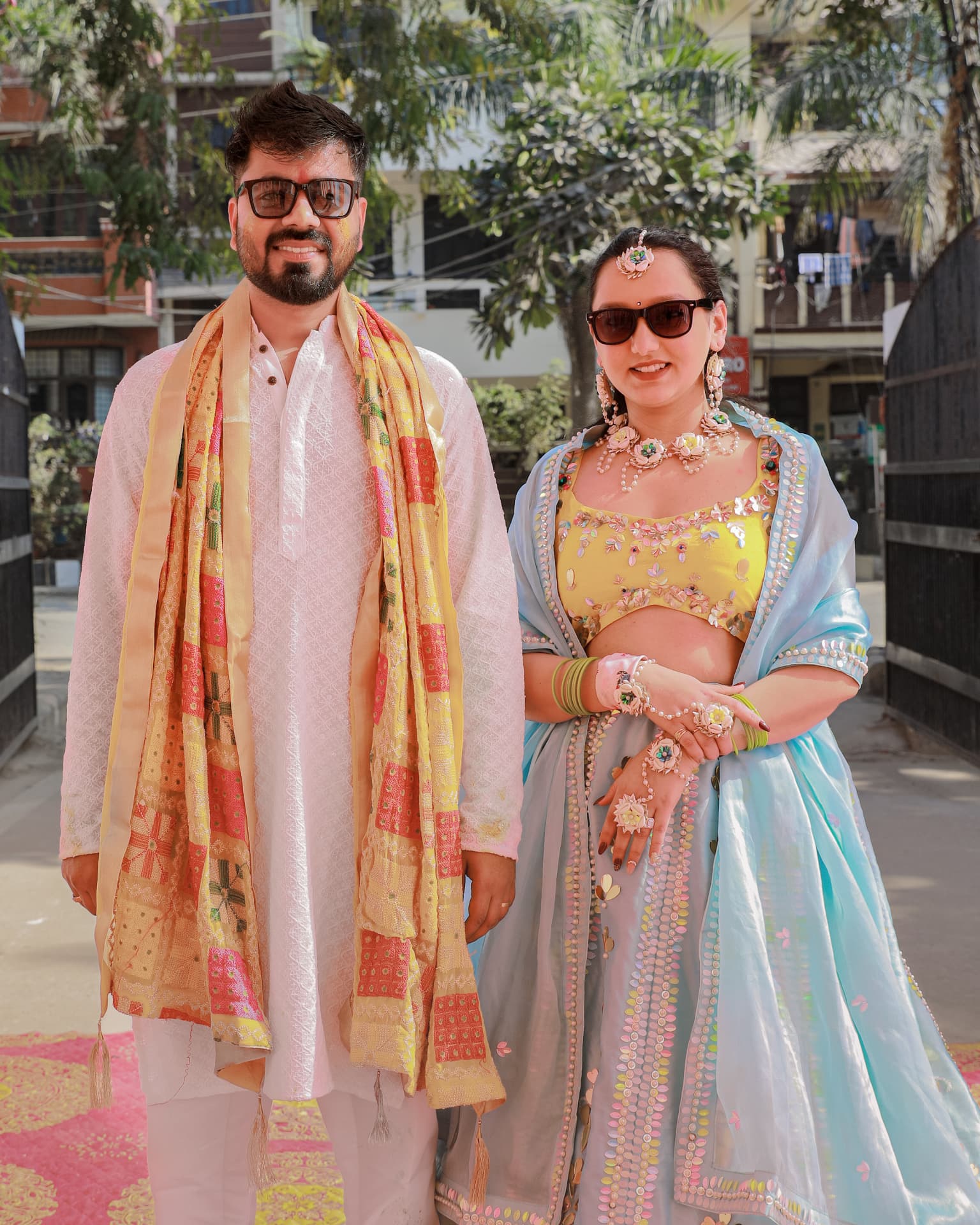 Anand and Soumya in pastel outfits on their haldi morning